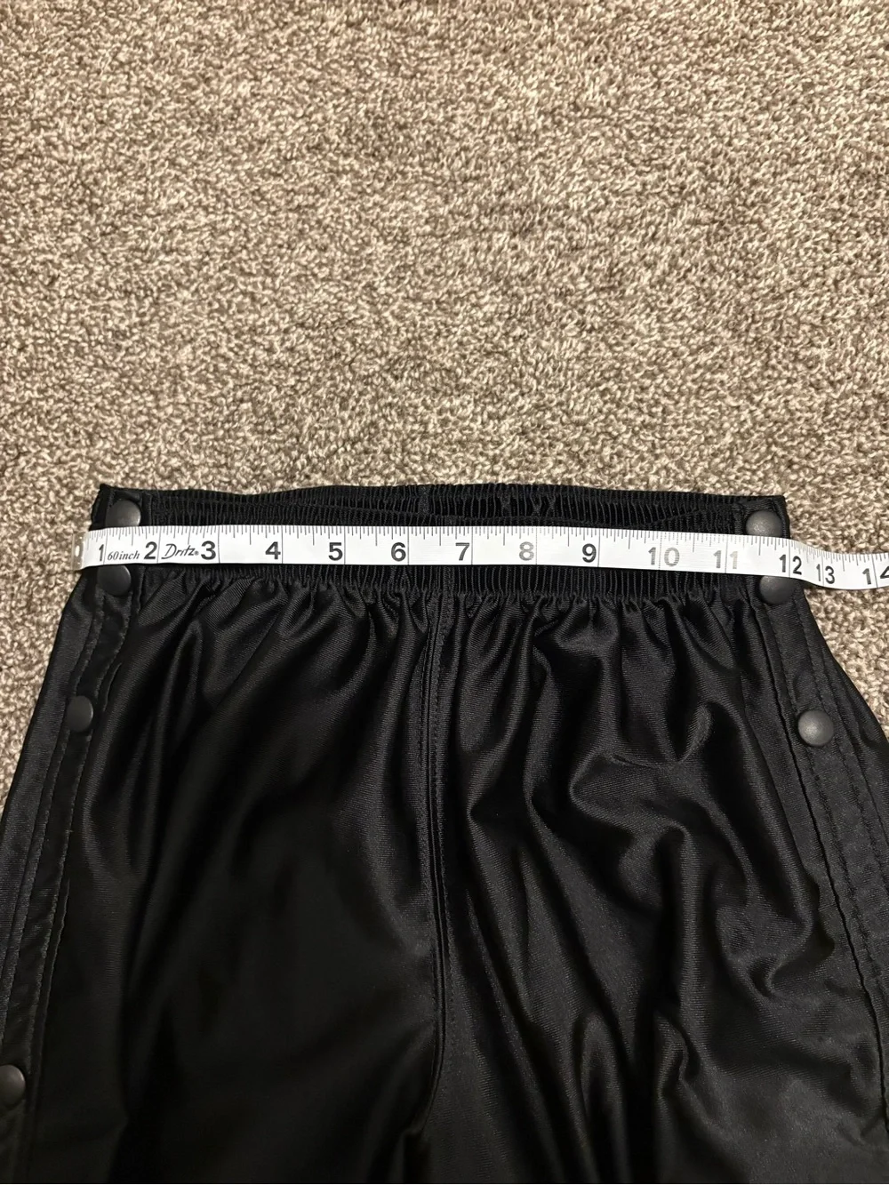 Vintage Nike Black Snap-Button Track Pants with White Swoosh